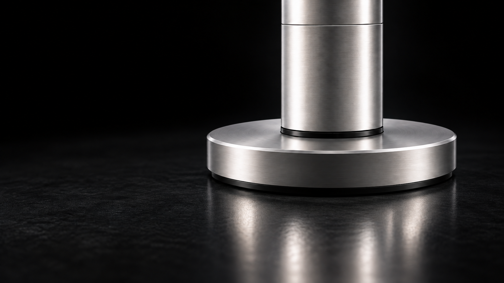 Floor-level close-up of the Tower20 E3 low-profile circular pedestal and recessed anti-slip ring